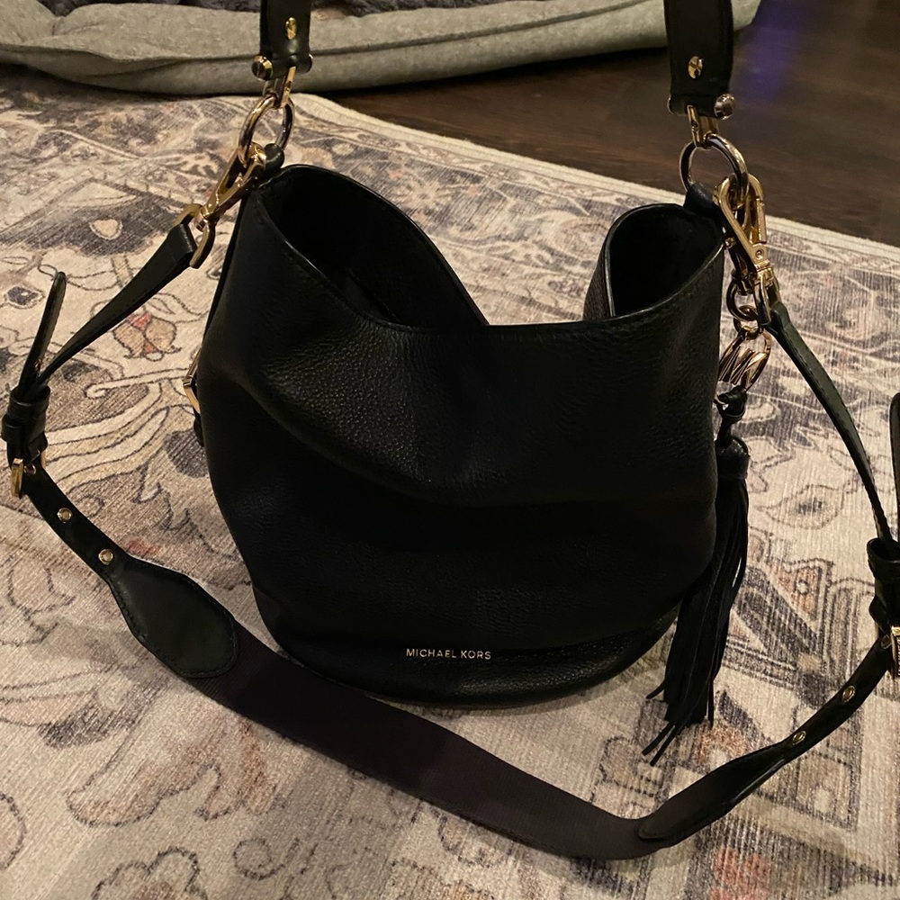 Black Michael Kors bucket bag. Gold hardware.